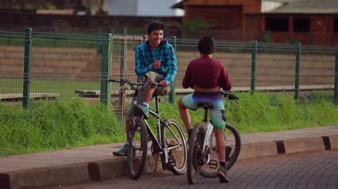 Kids on bicycles in Easter Island Stock Footage 64872417