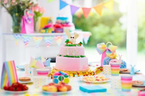 Kids birthday party decoration and cake. Stock Photos