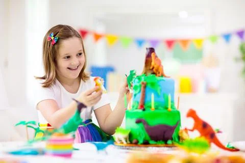 Kids birthday party. Dinosaur theme cake. Stock Photos
