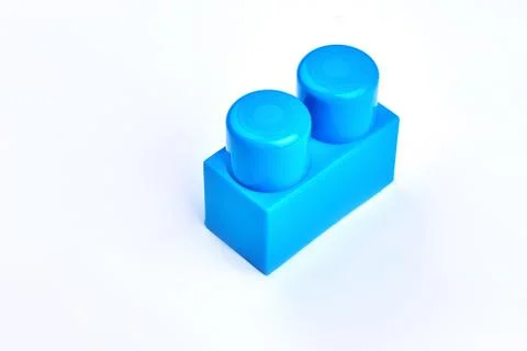 Kids blue plastic construction element. Stock Photos