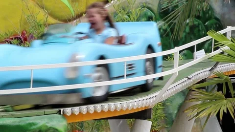 Kids on a car attraction Stock Footage 78483565