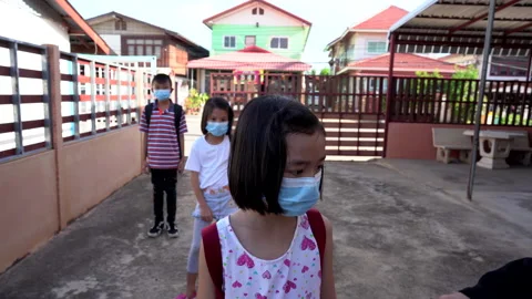 Kids checking body temperature by infrared thermometer for protect and safety Video stock 132587483