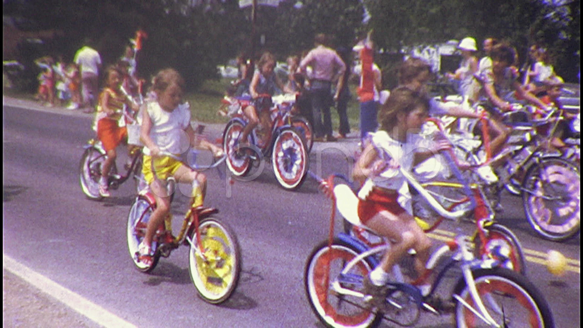 Kids CHILDREN RIDE on Bikes in Parade 19... | Stock Video | Pond5