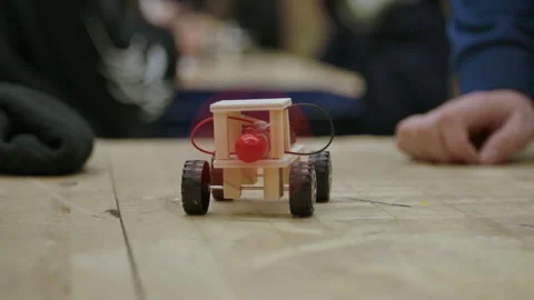 Kids class STEM learning motor car Stock Footage 283489572