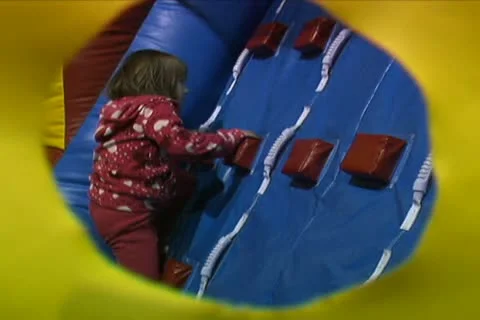 Kids Climbing Up Wall Stock Footage 10708669