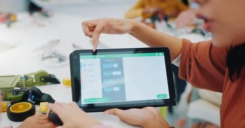 Kids, coding and learning robotics with tablet, screen and engineering app in 스톡 사진