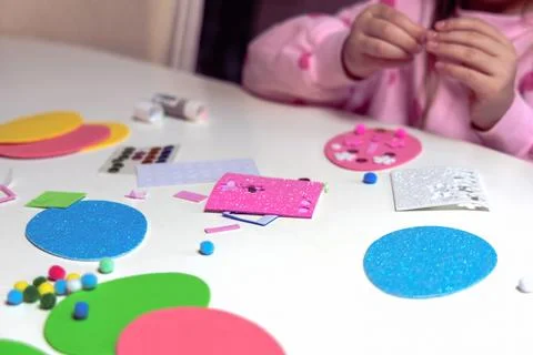 Kids creative easter craft making diy paper egg decorations. Stock Photos