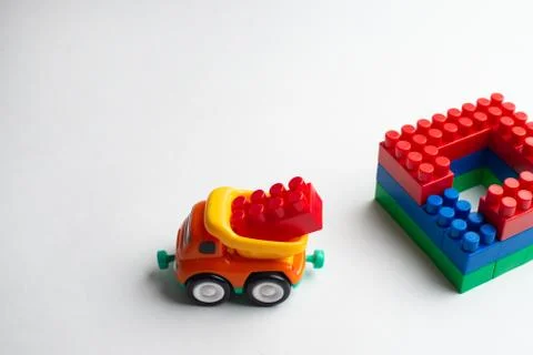 Kids development, Building blocks, Building construction and lorry Stock Photos