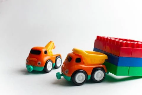 Kids development, Building blocks, Building construction and lorry Stock Photos