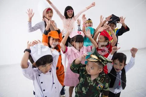 Kids with diverse multi profession uniform Stock Photos