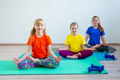 Kids doing exercises Stock Photos
