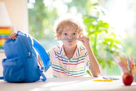 Kids doing homework. Children go back to school. Stock Photos