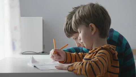 Kids doing their homework after school classes 스톡 동영상 245107598