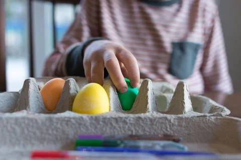 Kid's Easter egg creation process - dye, water color 스톡 사진