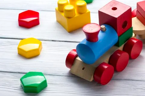 Kids educational developing toys frame on white background. Top view. Flat lay Foto stock