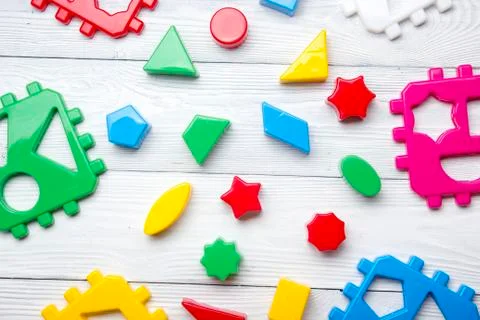 Kids educational developing toys frame on white background. Top view. Flat lay Stockfoto's