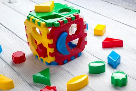 Kids educational developing toys frame on white background. Top view. Flat lay Foto stock