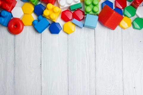 Kids educational developing toys frame on white background. Top view. Flat lay Stockfoto's