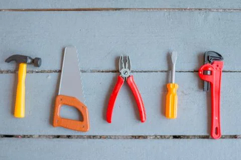 Kids educational developing toys frame on white background. Top view. Flat lay Stock Photos