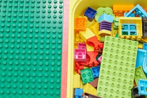 Kids educational developing toys frame on white background. Top view. Flat la Stock Photos
