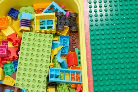 Kids educational developing toys frame on white background. Top view. Flat la Stock Photos