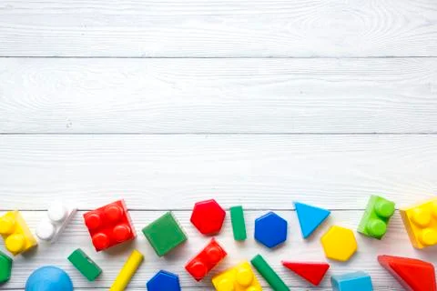 Kids educational developing toys frame on white background. Top view. Flat lay Stockfoto's