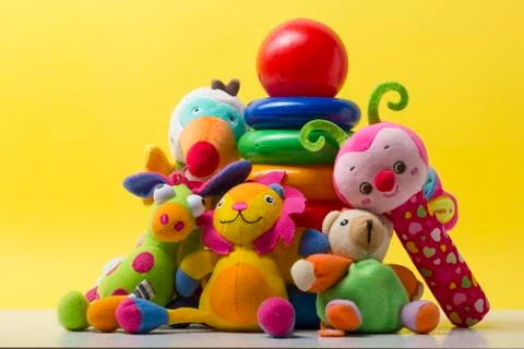 Kids educational developing toys frame on white background. Top view. Flat lay Stock Photos