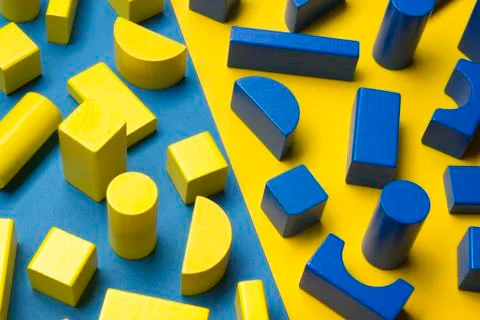 Kids educational developing toys frame on white background. Top view. Flat lay Stock Photos