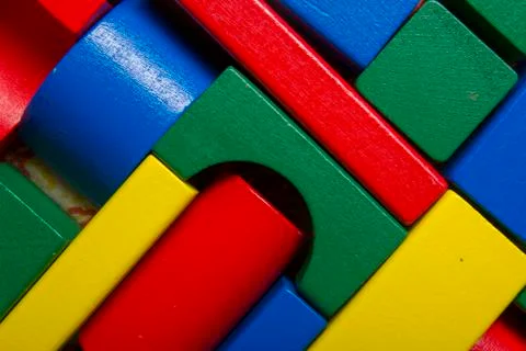 Kids educational developing toys frame on white background. Top view. Flat lay Photos