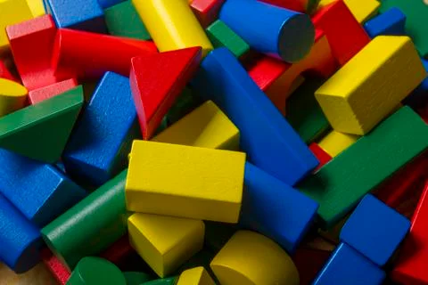 Kids educational developing toys frame on white background. Top view. Flat lay Stock Photos