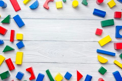 Kids educational developing toys frame on white background. Top view. Flat lay Foto stock