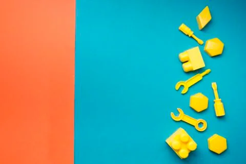 Kids educational developing toys frame on white background. Top view. Flat lay Photos