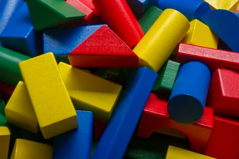 Kids educational developing toys frame on white background. Top view. Flat lay Stock Photos