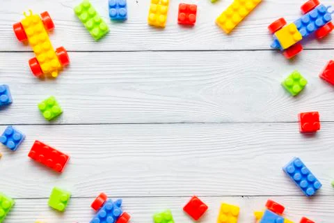 Kids educational developing toys frame on white background. Top view. Flat lay Stockfoto's