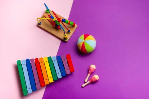 Kids educational developing toys frame on white background. Top view. Flat lay Stock Photos