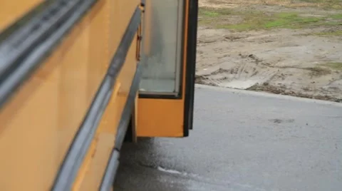 Kids Getting off of School Bus Stock Footage