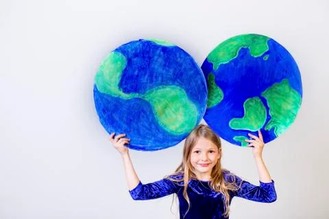 Kids with a globe Stock Photos