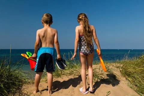 Kids going to the beach Stock Photos