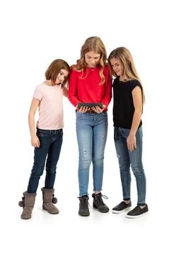 Kids: Grils Using Modern Digital Tablet Stock Photos