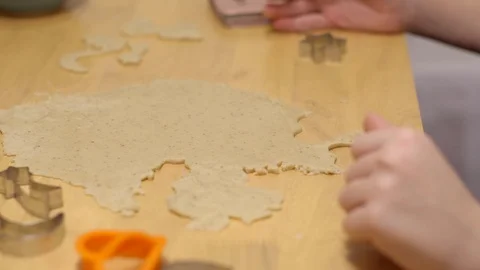 Kid's hand using star shape mold to make cookies Stock Footage 105783169