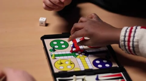 Kids hands playing a table game 스톡 동영상 55875857