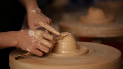 Kid's hands at pottery workshop. Creating pottery product with dirty hands on Stock Footage 107469067