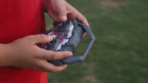 Kids hands remote control Stock Footage 37408554