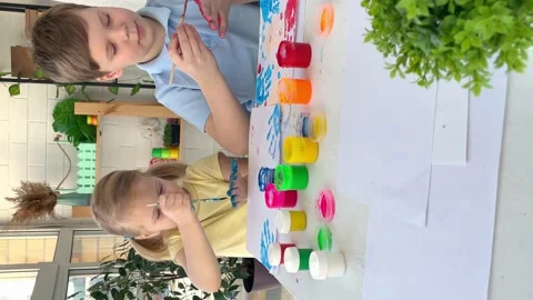 Kids have fun and create picture. Stock Footage 237825192