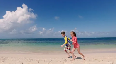 Kids having fun at beach Stock Footage 66277583