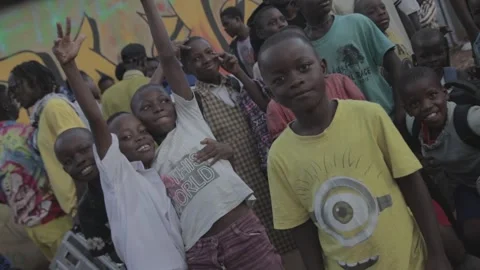 Kids having fun in a sub urban area in africa Stock Footage 248634846