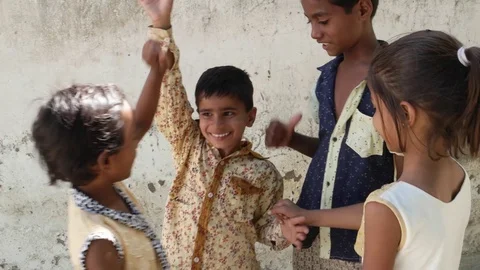 Kids having fun teasing and playing with each other, India  Stock Footage 69874145