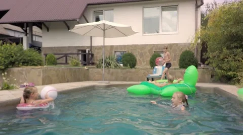 Kids Inflatable Giant Rideable Turtle. Children throw Beach Ball. Stock-Footage 66007558