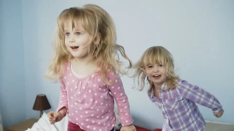 Kids Jumping on Bed Stock Footage 49763468