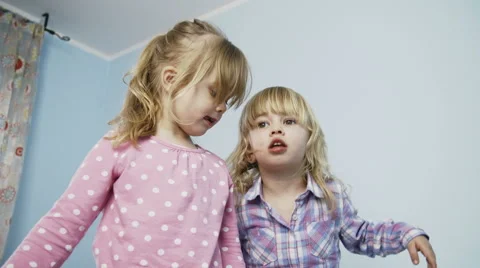 Kids Jumping on Bed Stock Footage 49764828